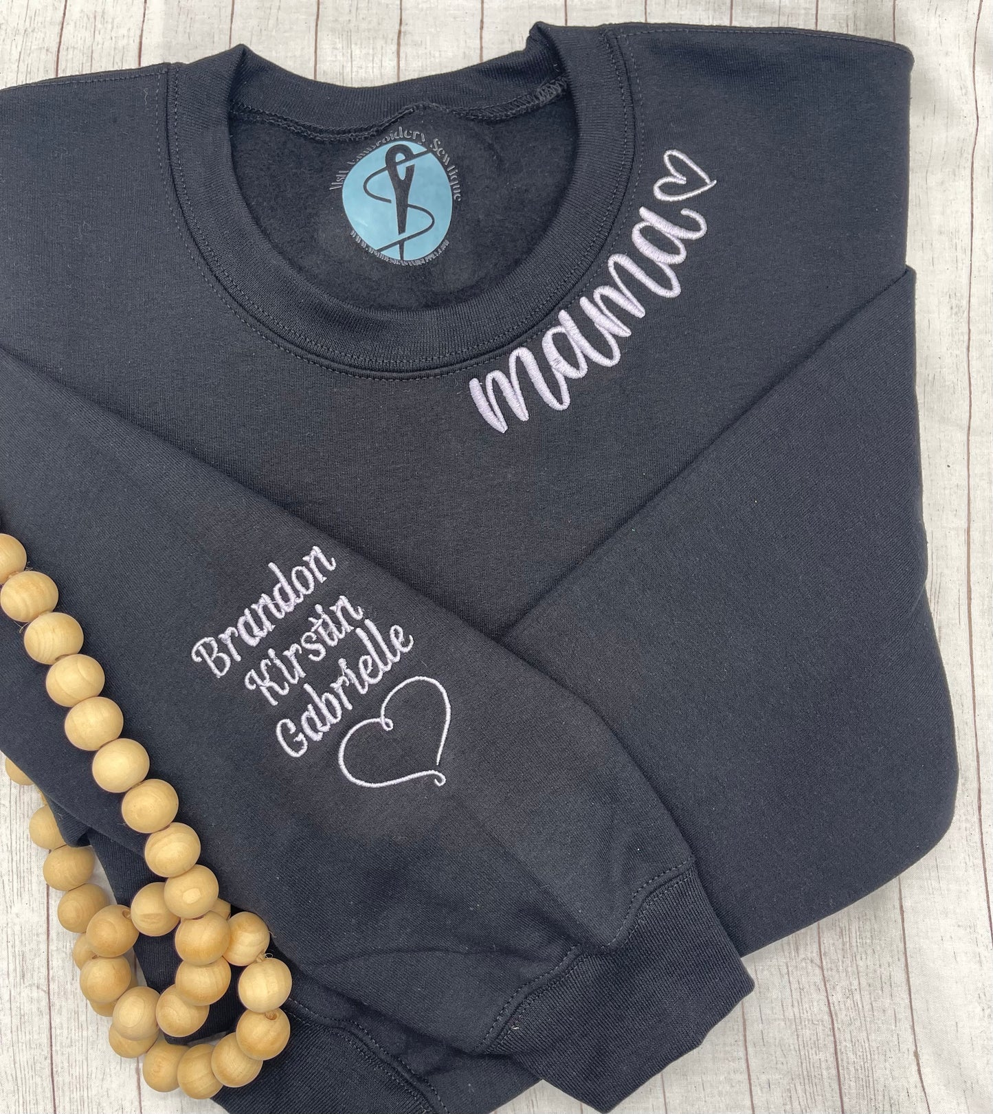 curved mama embroidery with heart on the sleeve