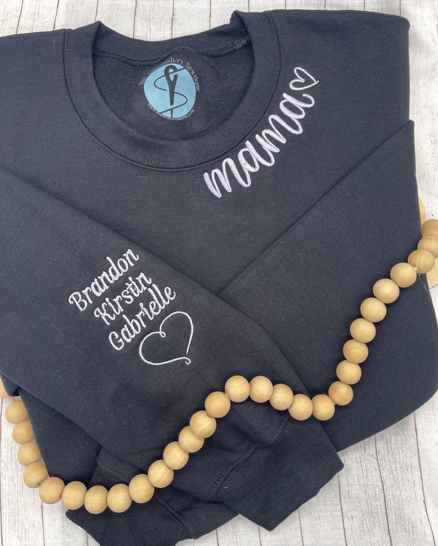 curved mama embroidery with heart on the sleeve